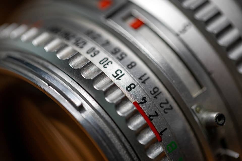 A close-up shot of a vintage camera lens